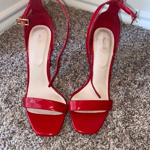 Red Aldo Pumps